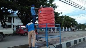 Hand sanitizer stations in Dili.