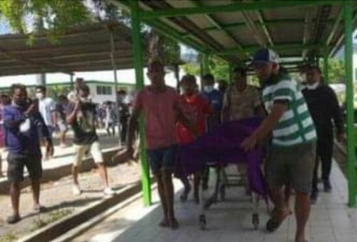 A Timor-Leste police officer shot and killed a father and son and left a third victim critically injured in Lahane village Dili early Saturday morning.