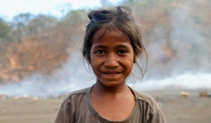Vanya, 8, lives just outside the dump and says she&#039;s been working here all her life Source: Ian Lloyd Neubauer/Al Jazeera